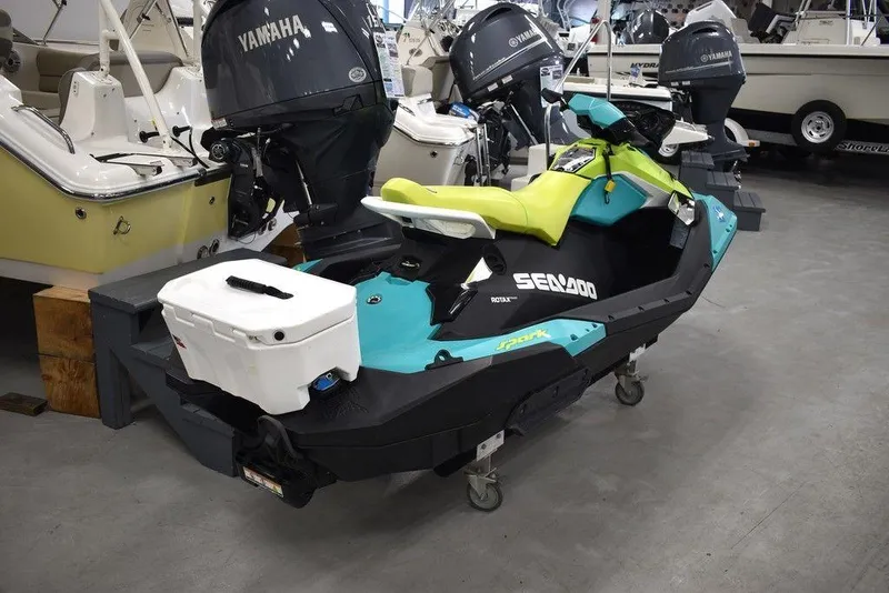 Slide: The Image of 2022 Sea-Doo Spark 3-up Rotax 900 ACE with Audio, displayed in a showroom. - 6