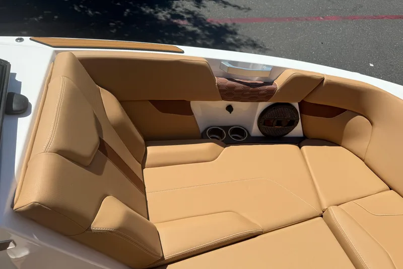 Slide: The Image of Luxurious tan seating in 2025 MasterCraft XT24 boat, featuring modern design and premium materials. - 32