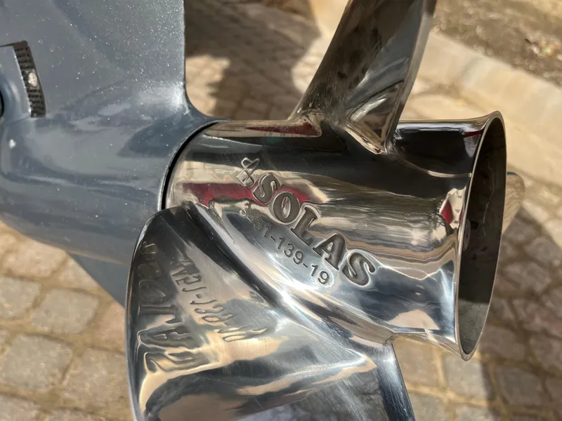 Slide: The Image of Close-up of a Solas propeller on a 2012 NauticStar 1810 boat. - 10