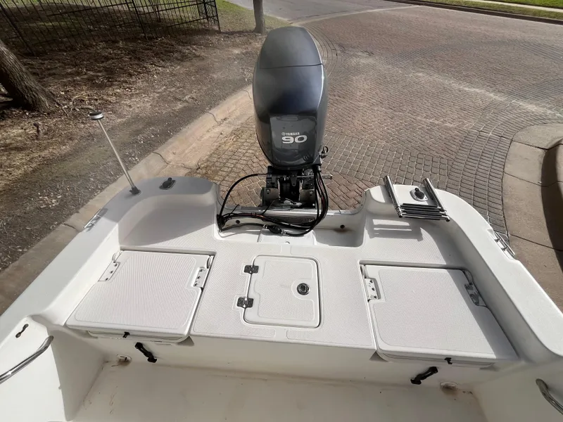 Slide: The Image of 2012 NauticStar 1810 boat with Yamaha 90 engine, rear deck view. - 27