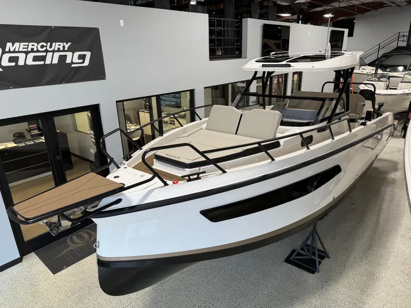 Slide: The Image of 2025 Navan S30 boat displayed indoors, featuring sleek design and modern amenities. - 18