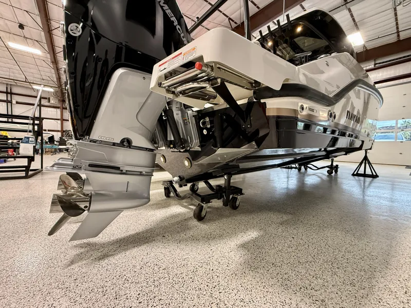 Slide: The Image of 2025 Navan S30 boat in showroom, showcasing sleek design and powerful engine. - 24