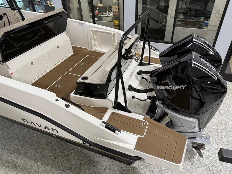 Slide: The Image of Navan S30 2025 boat with dual Mercury outboard engines, sleek design, and spacious deck. - 28