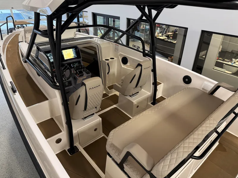 Slide: The Image of 2025 Navan S30 boat interior with modern dashboard and seating. - 30