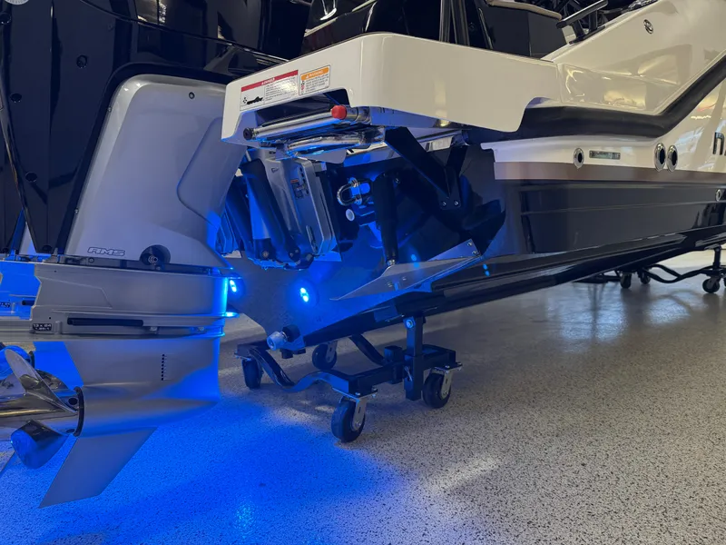 Slide: The Image of 2025 Navan S30 boat with illuminated blue lights and advanced propulsion system. - 36