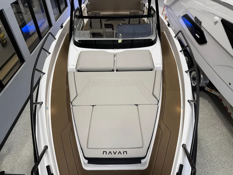 Slide: The Image of Navan S30 2025 boat interior with cushioned seating and sleek design. - 43