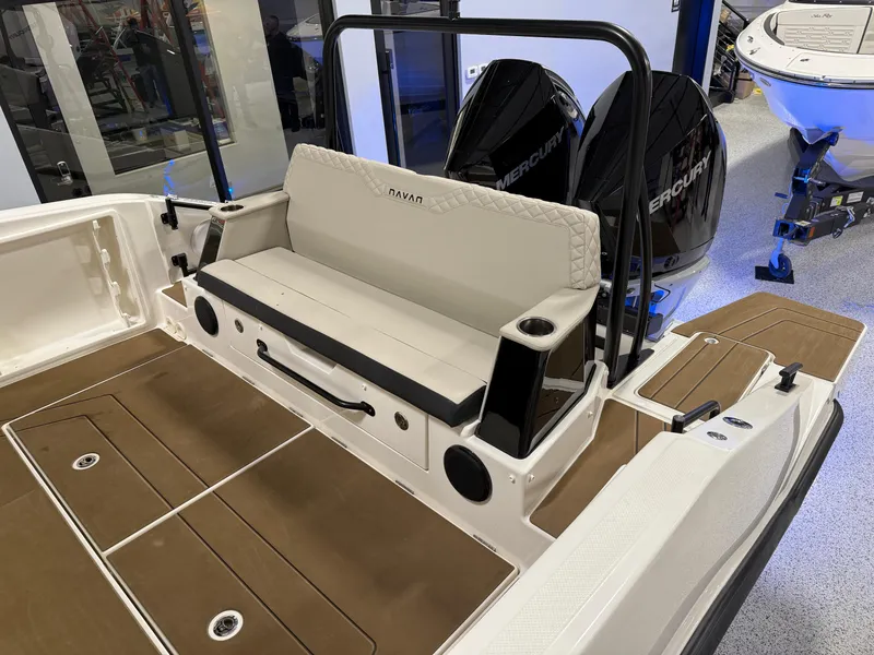 Slide: The Image of 2025 Navan S30 boat interior with seating and dual Mercury outboard engines. - 52