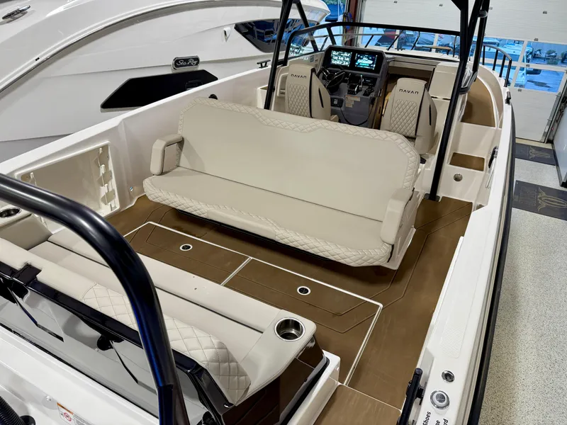 Slide: The Image of Luxurious interior of 2025 Navan S30 boat with plush seating and modern dashboard. - 57