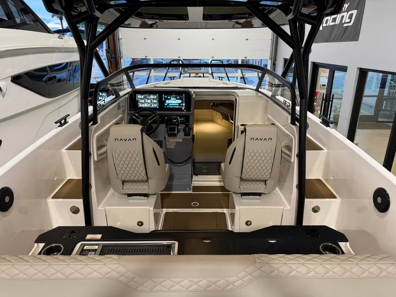 Slide: The Image of 2025 Navan S30 boat interior with modern dashboard and seating. - 59