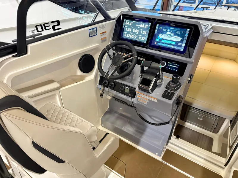 Slide: The Image of Interior cockpit of 2025 Navan S30 boat with advanced navigation displays. - 62