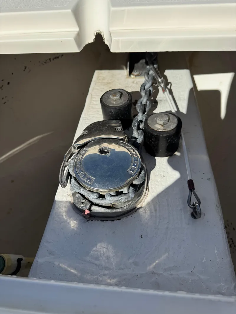 Slide: The Image of Anchor windlass on 2013 Cobia 296 Center Console boat. - 20