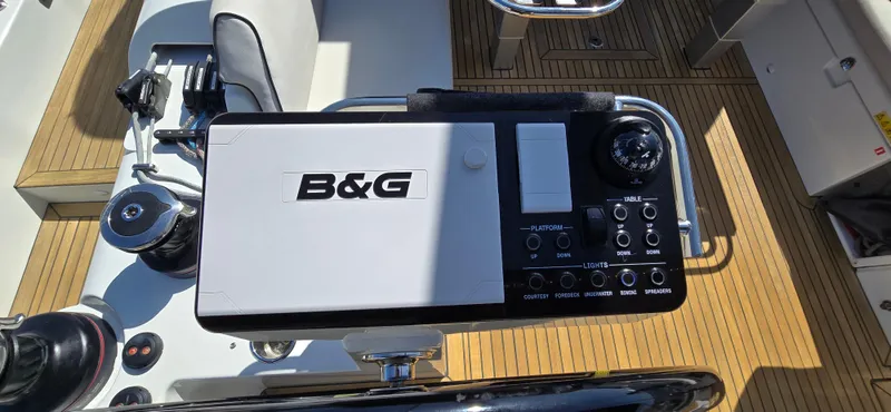 Slide: The Image of B&G navigation system on 2021 Beneteau Oceanis Yacht 54, featuring teak deck. - 18