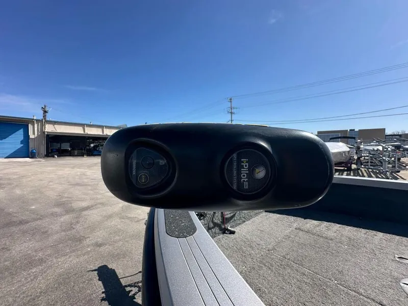 Slide: The Image of 2013 Crestliner Fish Hawk 1750 with iPilot trolling motor, outdoor setting. - 6