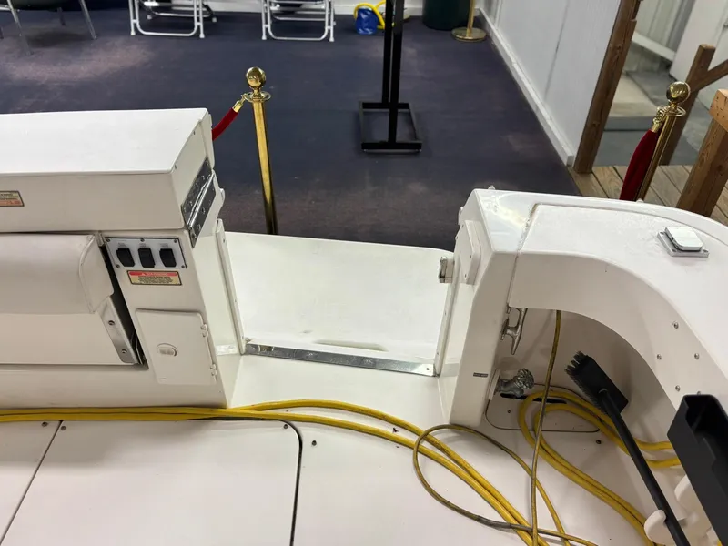 Slide: The Image of 1999 Sea Ray 370 Express Cruiser deck with yellow cables and equipment. - 30