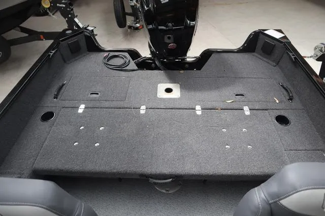 Slide: The Image of 2025 Lowe FM 1775 SC boat interior with spacious deck and motor mount. - 5