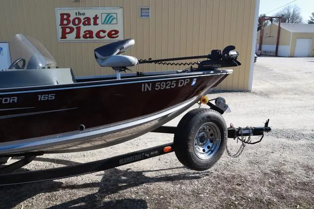 Slide: The Image of 2013 Alumacraft Navigator 165 CS boat on trailer at The Boat Place. - 3