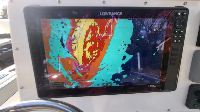 Slide: The Image of Lowrance marine GPS display on 2012 Sea Fox 216 boat, showing colorful navigation map. - 20