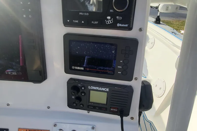 Slide: The Image of Control panel of a 2012 Sea Fox 216 boat with Yamaha and Lowrance electronics. - 22