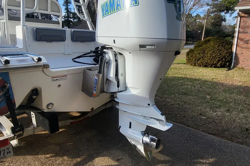 Slide: The Image of 2012 Sea Fox 216 boat with Yamaha outboard motor, parked on driveway. - 4