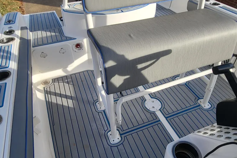 Slide: The Image of 2012 Sea Fox 216 boat interior with gray seating and deck. - 9