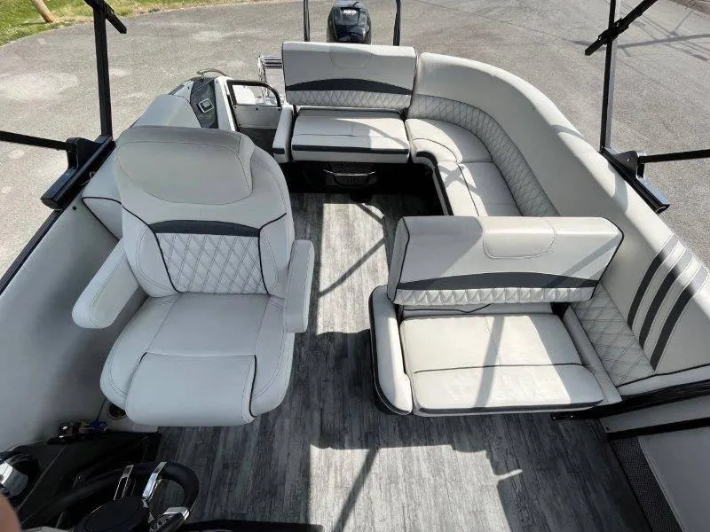 Slide: The Image of 2018 Crest Savannah 250 NX-L boat interior with luxurious seating and modern design. - 35