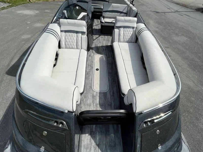 Slide: The Image of 2018 Crest Savannah 250 NX-L pontoon boat with spacious seating and modern design. - 42