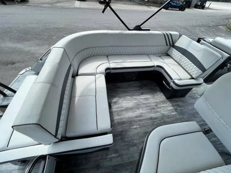 Slide: The Image of 2018 Crest Savannah 250 NX-L boat interior with luxurious seating and modern design. - 43