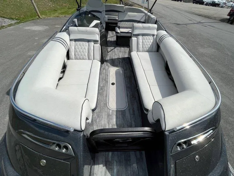 Slide: The Image of 2018 Crest Savannah 250 NX-L pontoon boat with spacious seating and modern design. - 44