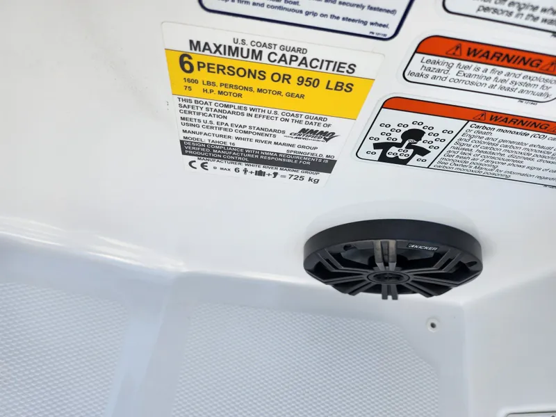 Slide: The Image of 2022 Tahoe T16 boat capacity label, 6 persons or 950 lbs, with speaker detail. - 13
