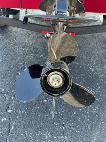 Slide: The Image of 2025 Tracker Pro Team 175 boat propeller on asphalt surface. - 4