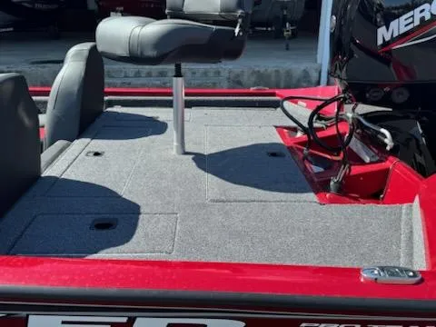 Slide: The Image of 2025 Tracker Pro Team 175 boat with gray seating and red accents, featuring a Mercury engine. - 5