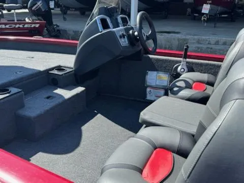 Slide: The Image of 2025 Tracker Pro Team 175 boat interior with steering console and seating. - 6