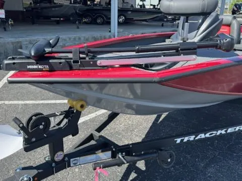 Slide: The Image of 2025 Tracker Pro Team 175 boat on trailer, featuring Minn Kota trolling motor. - 8