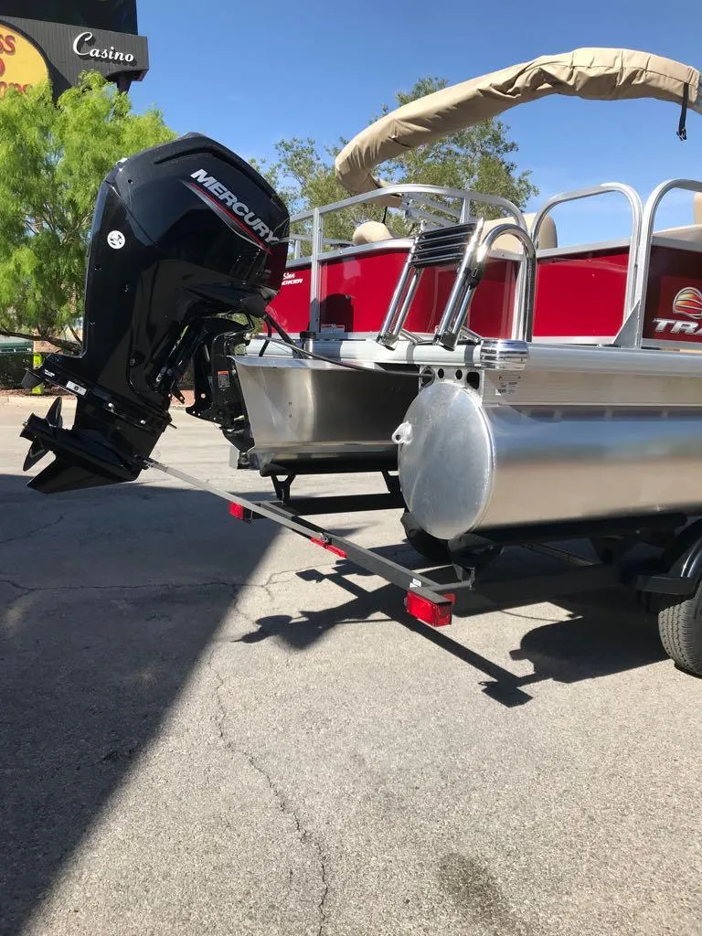 Slide: The Image of 2025 Sun Tracker Bass Buggy 18 DLX pontoon boat with Mercury outboard motor. - 6