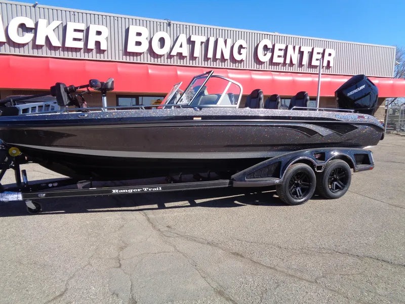 Slide: The Image of 2025 Ranger 621FS Pro boat at Tracker Boating Center, on a trailer. - 1