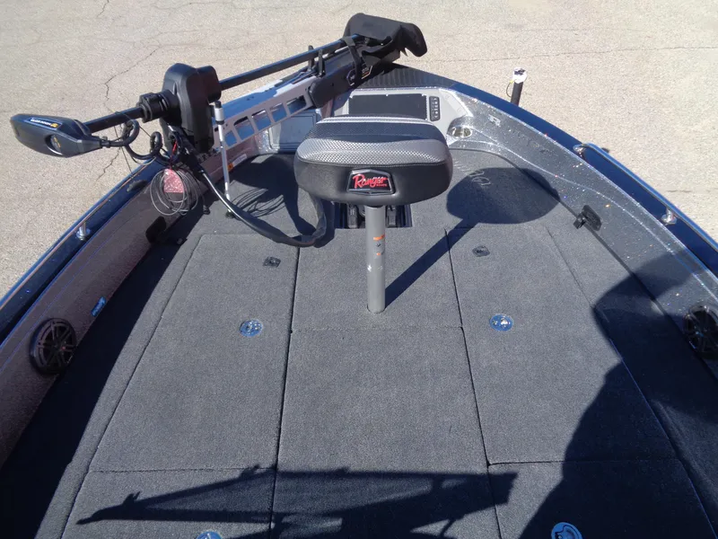 Slide: The Image of 2025 Ranger 621FS Pro boat deck with seat and trolling motor. - 12