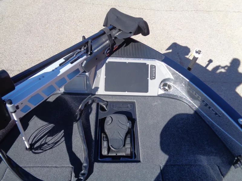 Slide: The Image of 2025 Ranger 621FS Pro boat dashboard with mounted equipment and control panel. - 13