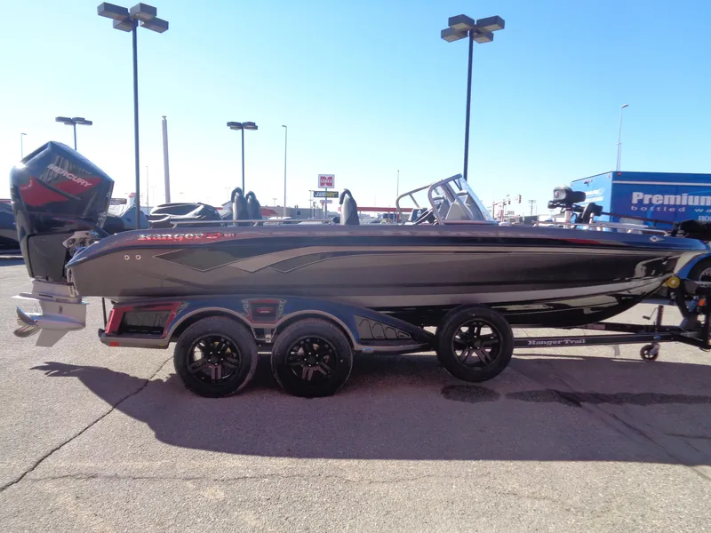 Slide: The Image of 2025 Ranger 621FS Pro boat on trailer, sleek design, parked outdoors. - 3
