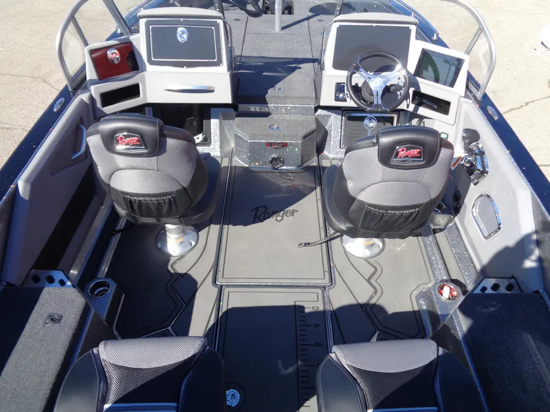 Slide: The Image of 2025 Ranger 621FS Pro boat interior with dual seats and modern dashboard. - 6
