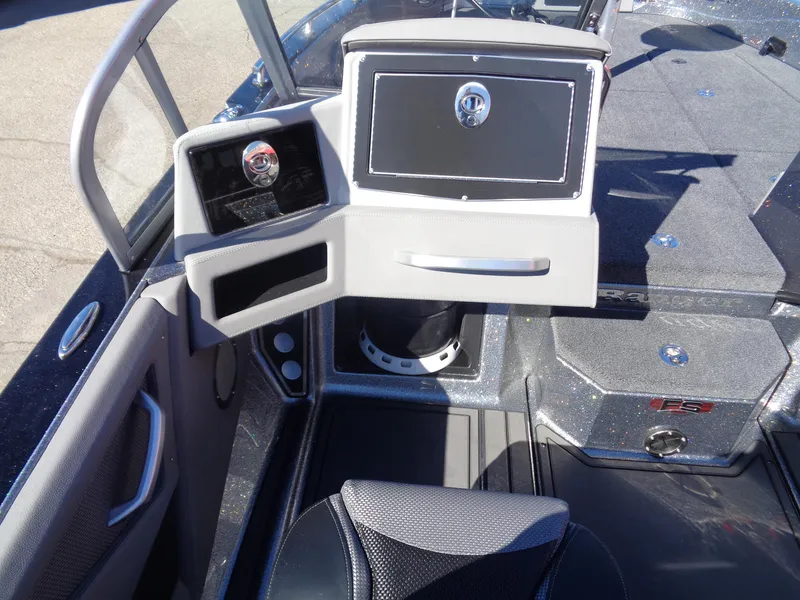 Slide: The Image of 2025 Ranger 621FS Pro boat interior with modern dashboard and seating. - 9