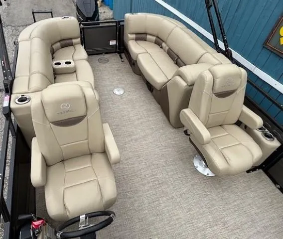 Slide: The Image of 2024 Regency 250 LE3 boat interior with beige seating and modern design. - 33