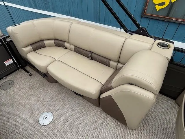 Slide: The Image of 2024 Regency 250 LE3 boat seating with beige and brown upholstery. - 34