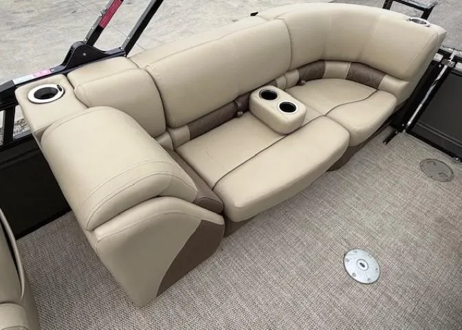Slide: The Image of Luxurious beige seating on 2024 Regency 250 LE3 boat with cup holders. - 40