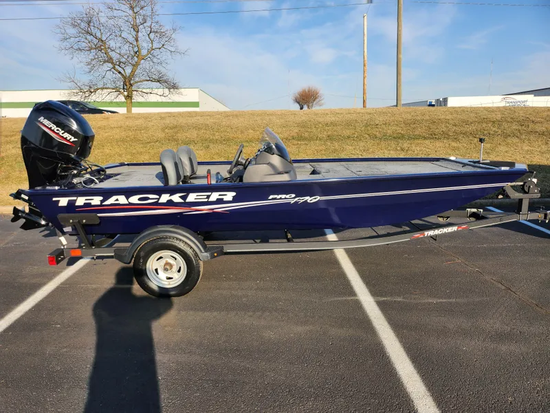 Slide: The Image of 2021 Tracker Pro 170 boat on trailer in parking lot. - 4