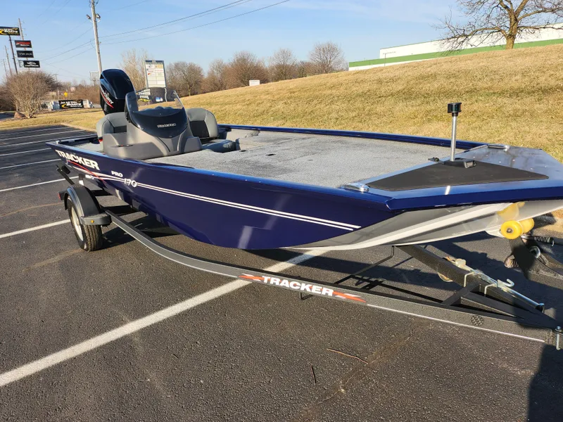 Slide: The Image of 2021 Tracker Pro 170 boat on trailer in parking lot. - 5