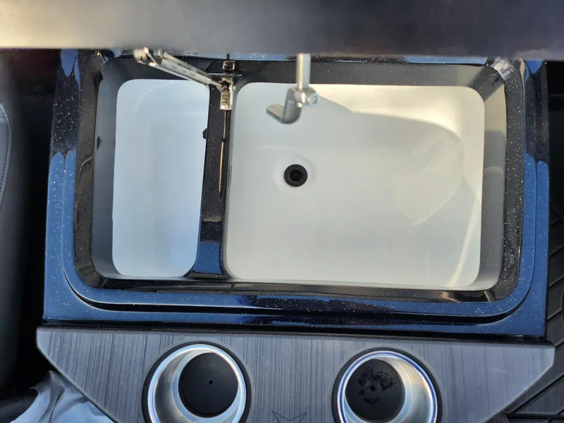 Slide: The Image of 2023 Vexus VX20 boat sink with dual cup holders, top view. - 22