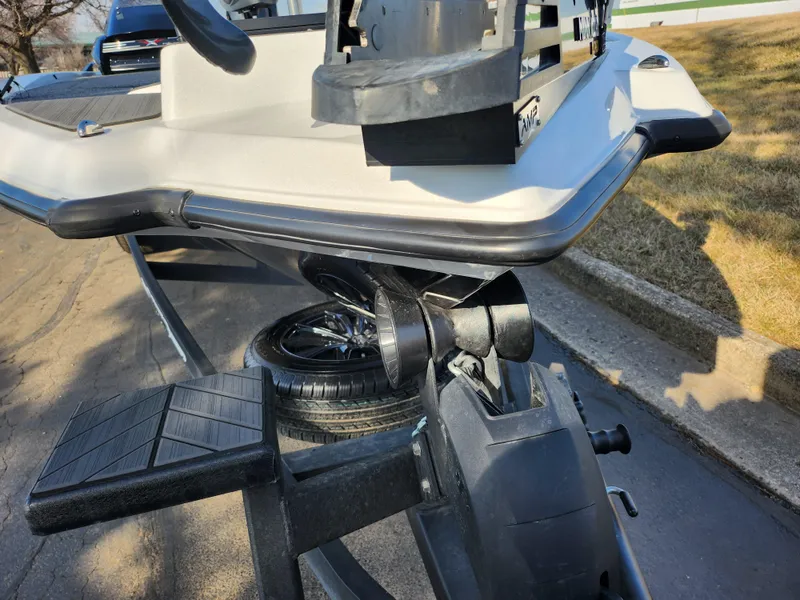 Slide: The Image of 2023 Vexus VX20 boat trailer with spare tire on a sunny day. - 6