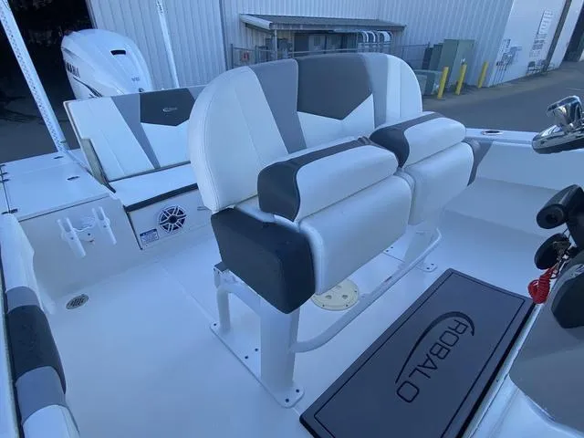 Slide: The Image of 2023 Robalo 266 Cayman boat deck with textured surface and fittings. - 31