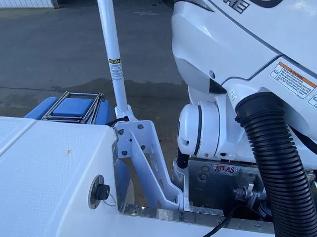 Slide: The Image of Close-up of 2023 Robalo 266 Cayman boat engine and components. - 48