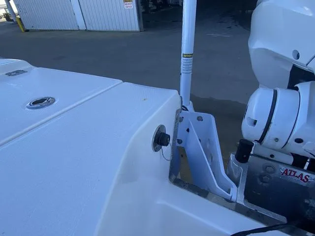 Slide: The Image of 2023 Robalo 266 Cayman boat detail with motor mount and deck view. - 49